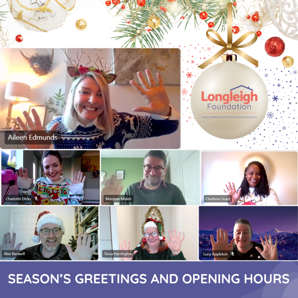 A cheerful, festive virtual team photo of Longleigh Foundation members, each waving in their video frames. Participants wear Christmas attire, including sweaters, Santa hats, and festive headbands. The top right corner features the Longleigh Foundation logo on a bauble, with "Season's Greetings and Opening Hours" text displayed below.